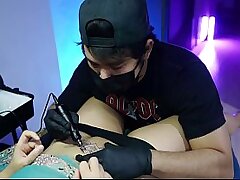 Tattoo Artist Seduces with Non-Stop Squirting